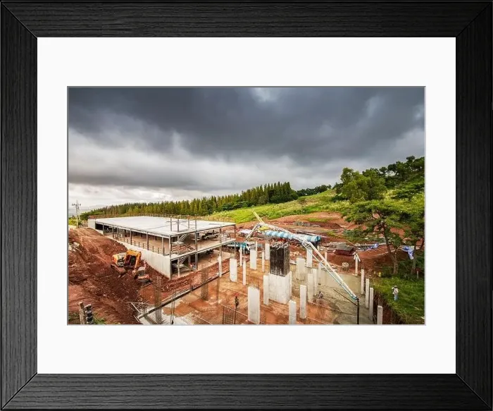 Framed Print : people working at site construction under rain cloud Framed Print : people working at site construction under rain cloud