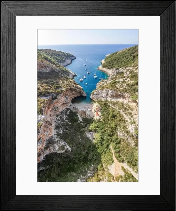 Framed Print : Aerial drone shot of iconic Stiniva cove beach of Adriatic sea on Vis Island in Croatia summer Framed Print : Aerial drone shot of iconic Stiniva cove beach of Adriatic sea on Vis Island in Croatia summer