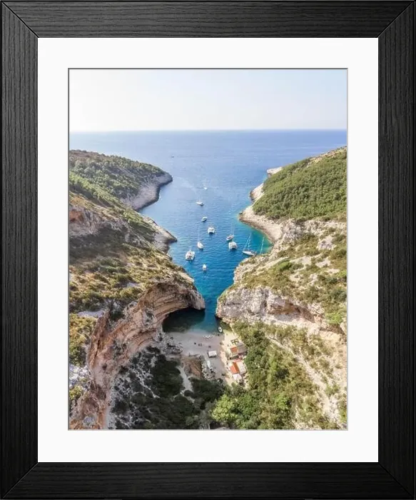 Framed Print : Aerial drone shot of iconic Stiniva cove beach of Adriatic sea on Vis Island in Croatia summer Framed Print : Aerial drone shot of iconic Stiniva cove beach of Adriatic sea on Vis Island in Croatia summer
