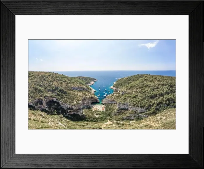 Framed Print : Aerial drone shot of tourists relax at Stiniva cove beach Adriatic on Vis Island in Croatia summer Framed Print : Aerial drone shot of tourists relax at Stiniva cove beach Adriatic on Vis Island in Croatia summer