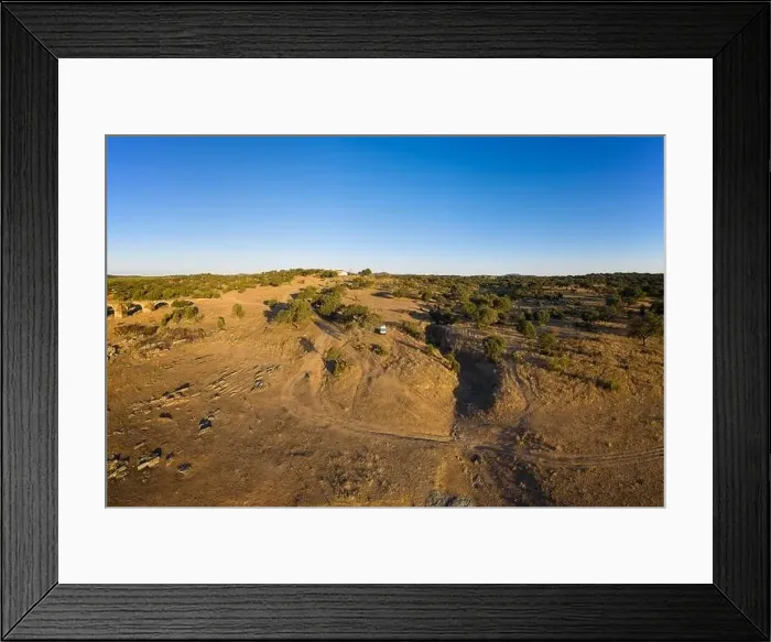 Framed Print : Camper van drone aerial view alone on an Alentejo landscape between the trees, in Portugal Framed Print : Camper van drone aerial view alone on an Alentejo landscape between the trees, in Portugal