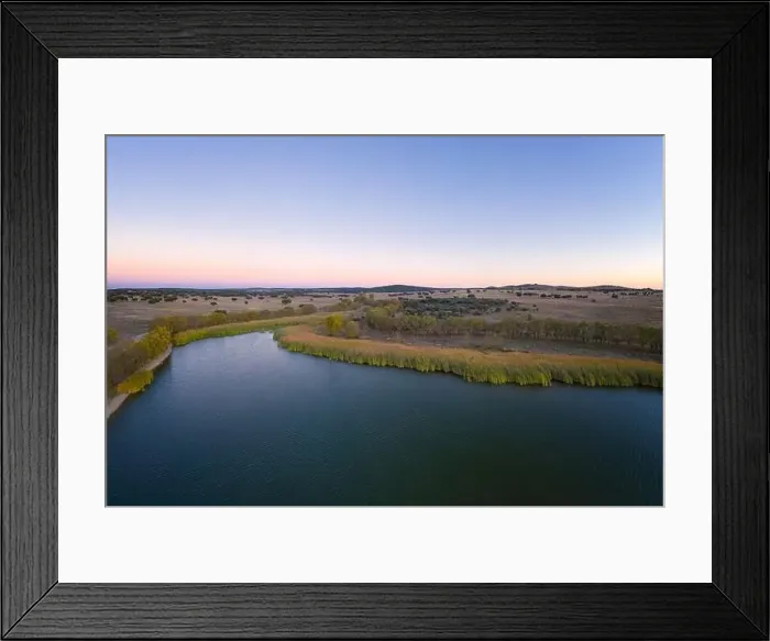 Framed Print : Lake drone aerial view at sunset in Alentejo, Portugal Framed Print : Lake drone aerial view at sunset in Alentejo, Portugal