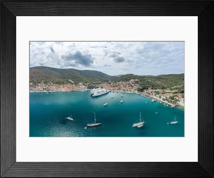Framed Print : Aerial drone shot of cruise ferry at Adriatic sea port on Vis Island in Croatia summer Framed Print : Aerial drone shot of cruise ferry at Adriatic sea port on Vis Island in Croatia summer