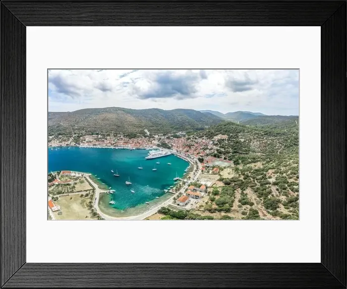 Framed Print : Aerial drone shot of cruise ferry at Adriatic sea port on Vis Island in Croatia summer Framed Print : Aerial drone shot of cruise ferry at Adriatic sea port on Vis Island in Croatia summer