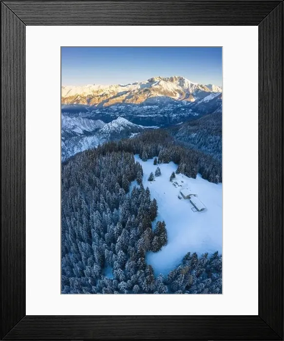 Framed Print : Aerial view of the Valmezzana hut and Presolana massif during a winter sunrise from Monte Pora Framed Print : Aerial view of the Valmezzana hut and Presolana massif during a winter sunrise from Monte Pora