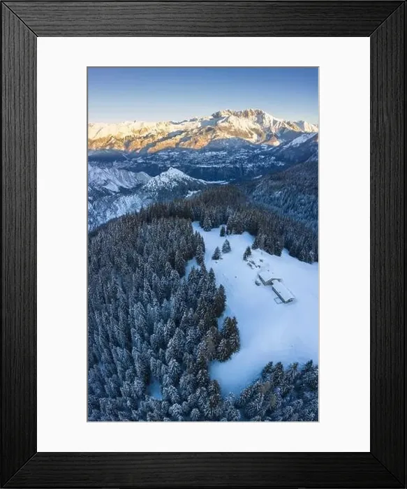 Framed Print : Aerial view of the Valmezzana hut and Presolana massif during a winter sunrise from Monte Pora Framed Print : Aerial view of the Valmezzana hut and Presolana massif during a winter sunrise from Monte Pora