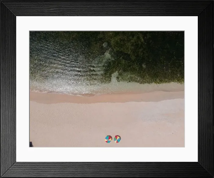 Framed Print : Aerial view of beautiful blue sea waves breaking on sandy coastline Framed Print : Aerial view of beautiful blue sea waves breaking on sandy coastline