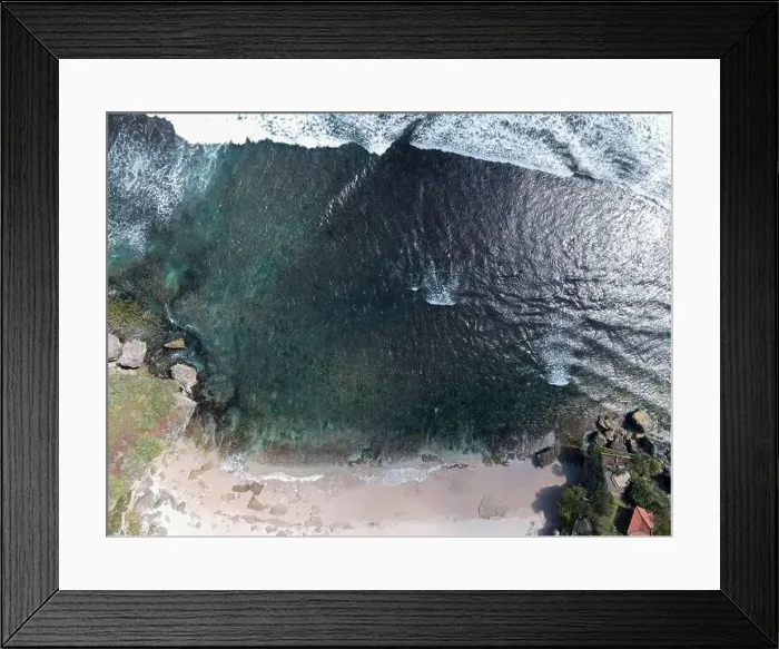 Framed Print : Aerial view of beautiful blue sea waves breaking on sandy coastline Framed Print : Aerial view of beautiful blue sea waves breaking on sandy coastline