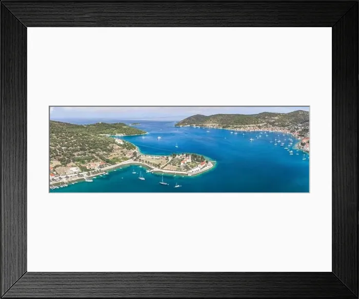 Framed Print : Aerial panoramic view of Vis Island port with St. Jeronima church prirovo beach and Adriatic coastline in summer Framed Print : Aerial panoramic view of Vis Island port with St. Jeronima church prirovo beach and Adriatic coastline in summer