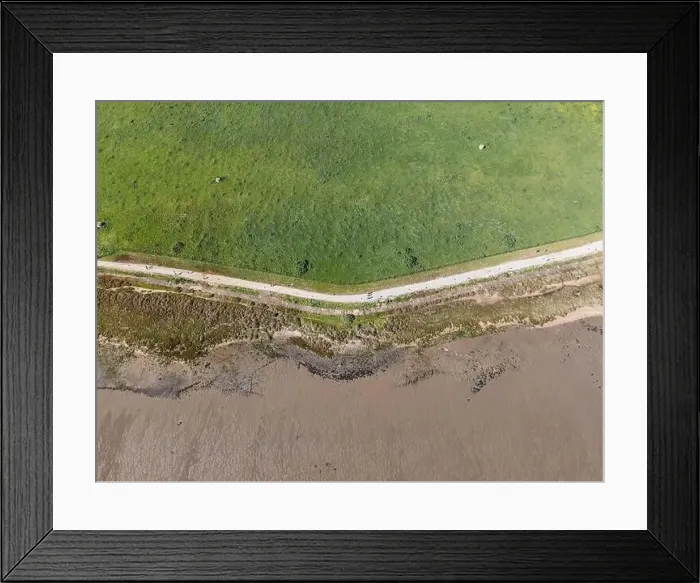 Framed Print : Aerial view of a small walkway path along Tagus river in Lisbon, Portugal Framed Print : Aerial view of a small walkway path along Tagus river in Lisbon, Portugal