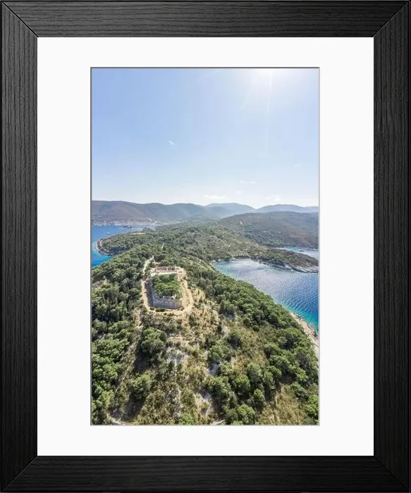 Framed Print : Aerial drone shot of stone Fort George Croatia on top of hill in Adriatic sea on Vis Island in summer Framed Print : Aerial drone shot of stone Fort George Croatia on top of hill in Adriatic sea on Vis Island in summer