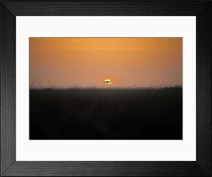Framed Print : Drone quadcopter with digital camera in flight at sunset, Silhouette of drone at sunset Framed Print : Drone quadcopter with digital camera in flight at sunset, Silhouette of drone at sunset