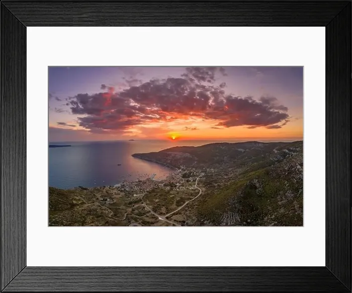 Framed Print : Aerial drone shot sunset over Adriatic horizon burning sky in Komiza port on Vis Island in Croatia summer Framed Print : Aerial drone shot sunset over Adriatic horizon burning sky in Komiza port on Vis Island in Croatia summer