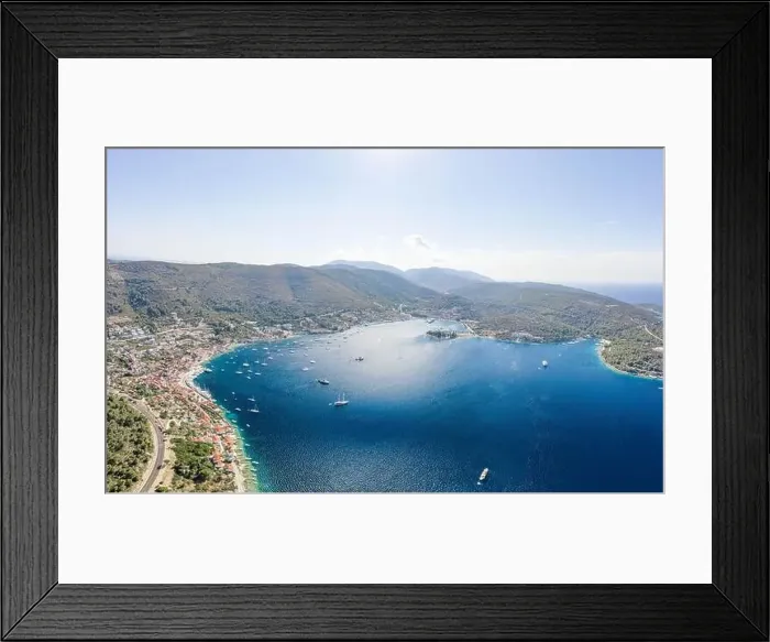 Framed Print : Aerial drone shot of town port Adriatic coastline on Vis Island in Croatia summer Framed Print : Aerial drone shot of town port Adriatic coastline on Vis Island in Croatia summer