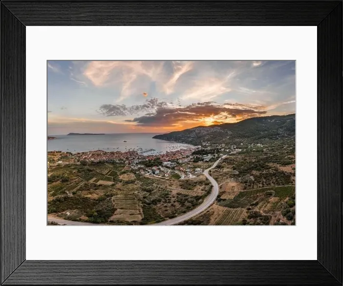 Framed Print : Aerial drone shot of Komiza town with sunset burning sky on Vis Island in Croatia summer Framed Print : Aerial drone shot of Komiza town with sunset burning sky on Vis Island in Croatia summer