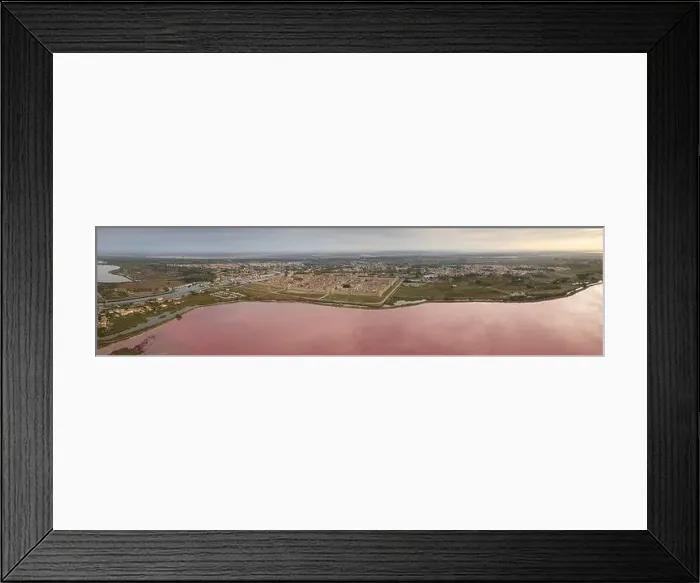 Framed Print : Aerial panoramic of the medieval city of Aigues-Mortes and the Etang de la Ville Framed Print : Aerial panoramic of the medieval city of Aigues-Mortes and the Etang de la Ville