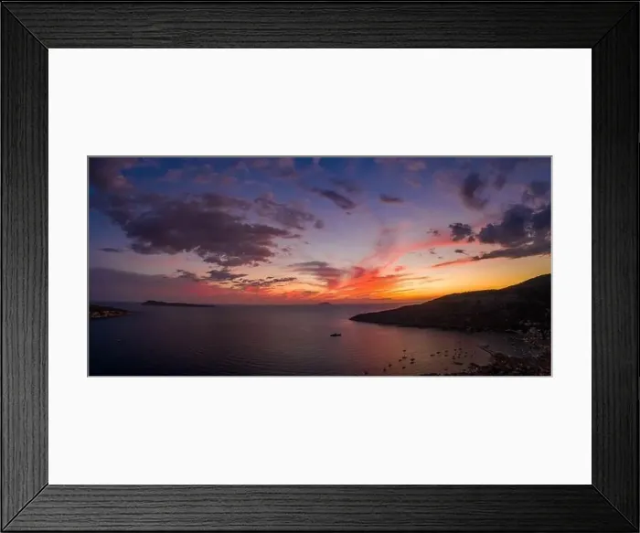 Framed Print : Aerial panorama drone shot of sunset burning sky clouds on Komiza town over Vis Island in Croatia Summer Framed Print : Aerial panorama drone shot of sunset burning sky clouds on Komiza town over Vis Island in Croatia Summer