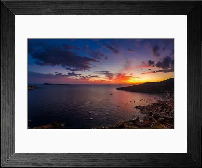 Framed Print : Aerial drone shot of sunset burning sky clouds on Komiza town over Vis Island in Croatia Summer Framed Print : Aerial drone shot of sunset burning sky clouds on Komiza town over Vis Island in Croatia Summer