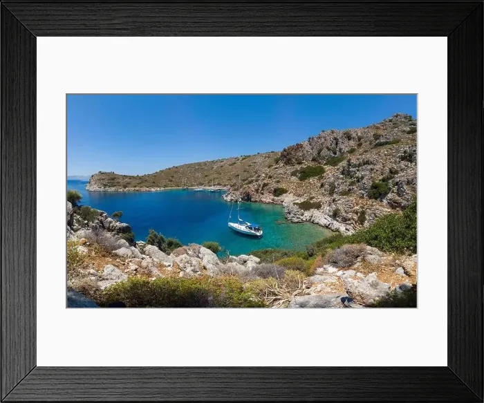 Framed Print : Aerial view of sailing boat anchored in turquoise color wonderful sea bay Framed Print : Aerial view of sailing boat anchored in turquoise color wonderful sea bay