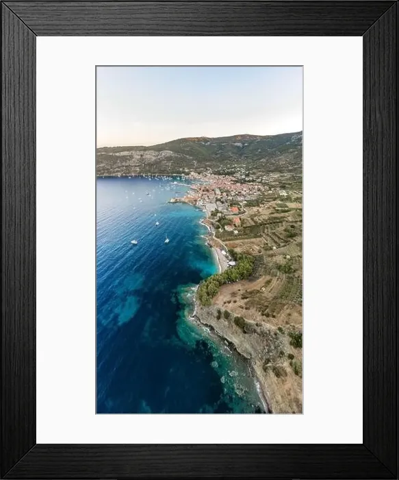 Framed Print : Aerial drone shot of Adriatic coastline dock by Komiza on Vis Island in morning before sunrise in Croatia summer Framed Print : Aerial drone shot of Adriatic coastline dock by Komiza on Vis Island in morning before sunrise in Croatia summer