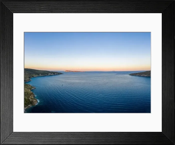 Framed Print : Aerial drone shot of Adriatic sea Bisevo island from Komiza Vis Island view in Croatia summer before sunrise Framed Print : Aerial drone shot of Adriatic sea Bisevo island from Komiza Vis Island view in Croatia summer before sunrise