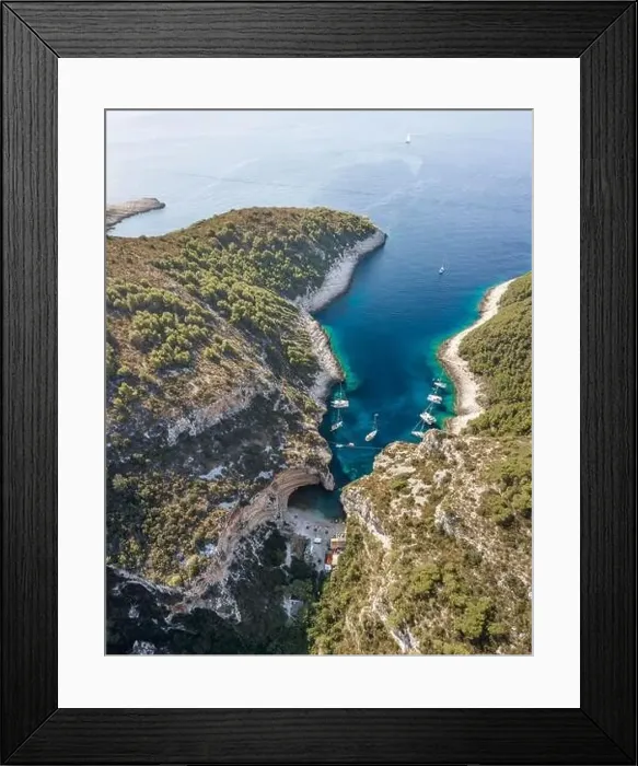 Framed Print : Aerial drone shot of Stiniva cove beach of Adriatic sea on Vis Island in Croatia summer Framed Print : Aerial drone shot of Stiniva cove beach of Adriatic sea on Vis Island in Croatia summer
