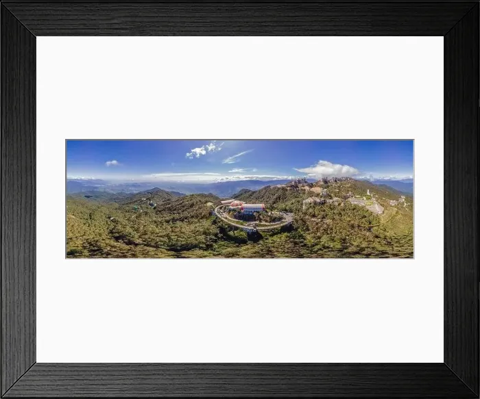 Framed Print : Top aerial view of the famous Golden Bridge is lifted by two giant hands in the tourist resort on Ba Na Hill in Da Nang Framed Print : Top aerial view of the famous Golden Bridge is lifted by two giant hands in the tourist resort on Ba Na Hill in Da Nang