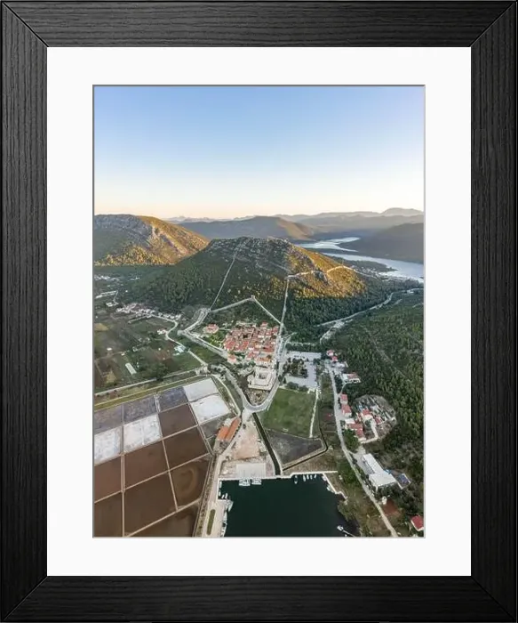 Framed Print : Aerial drone shot of Ston city wall over hill in Ragusa region near Dubrovnik in Croatia summer sunrise Framed Print : Aerial drone shot of Ston city wall over hill in Ragusa region near Dubrovnik in Croatia summer sunrise