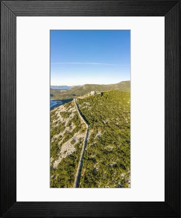 Framed Print : Aerial drone shot of City Wall of Ston over hill to Mali Ston in Croatia summer morning sunrise