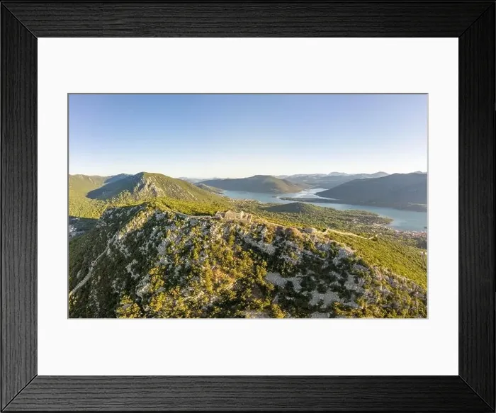 Framed Print : Aerial drone shot of Fortress of City of Ston on top of hill in Ragusa near Dubrovnik in Croatia sunrise Framed Print : Aerial drone shot of Fortress of City of Ston on top of hill in Ragusa near Dubrovnik in Croatia sunrise