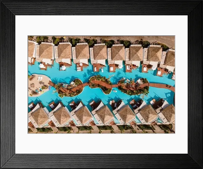 Framed Print : Aerial top view by drone of a tropical hotel with a pool Framed Print : Aerial top view by drone of a tropical hotel with a pool