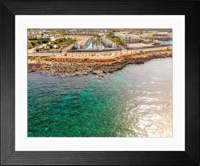 Framed Print : Aerial top view by drone of a tropical hotel with a pool Framed Print : Aerial top view by drone of a tropical hotel with a pool