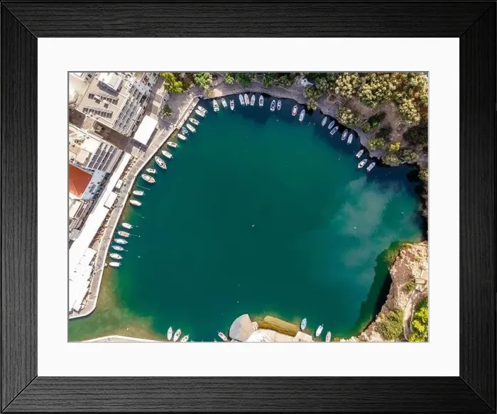 Framed Print : Aerial top view by drone of Voulismeni Lake in Agios Nikolaos city. Greece, Crete Framed Print : Aerial top view by drone of Voulismeni Lake in Agios Nikolaos city. Greece, Crete