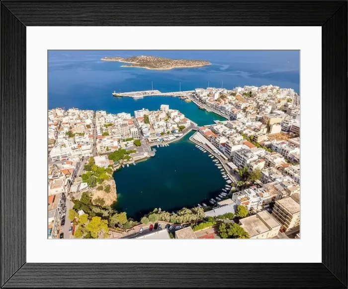 Framed Print : Aerial top view by drone of Agios Nikolaos city. Greece, Crete Framed Print : Aerial top view by drone of Agios Nikolaos city. Greece, Crete