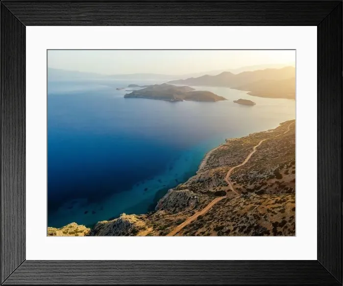 Framed Print : Aerial view by drone of idyllic seascape with mediterranean island Framed Print : Aerial view by drone of idyllic seascape with mediterranean island