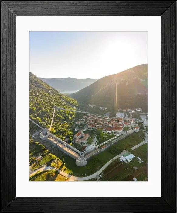 Framed Print : Aerial drone shot of Ston city wall over hill in Ragusa region near Dubrovnik in Croatia summer sunrise Framed Print : Aerial drone shot of Ston city wall over hill in Ragusa region near Dubrovnik in Croatia summer sunrise