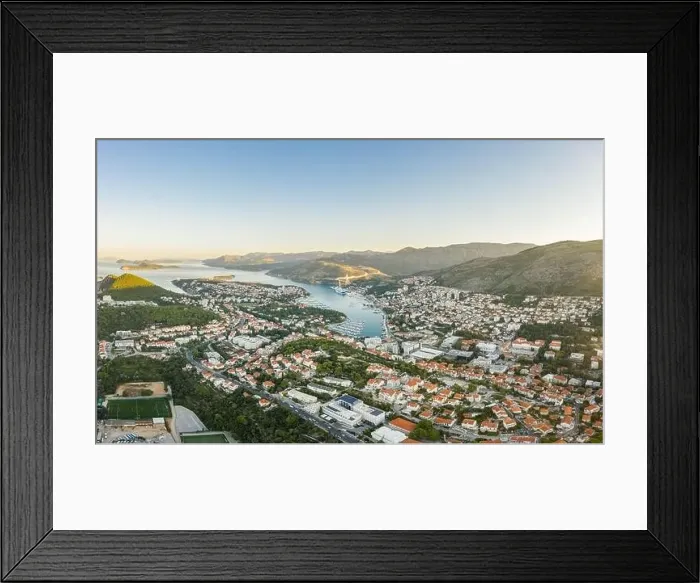 Framed Print : Aerial drone shot of Lapad Dubrovnik bridge with sunrise over peak in Croatia summer morning Framed Print : Aerial drone shot of Lapad Dubrovnik bridge with sunrise over peak in Croatia summer morning
