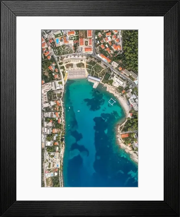 Framed Print : Aerial overhead drone shot of sunset beach in Dubrovnik by Dalmatia coastline in Croatia summer Framed Print : Aerial overhead drone shot of sunset beach in Dubrovnik by Dalmatia coastline in Croatia summer