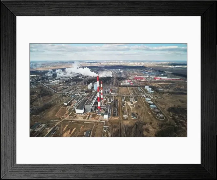 Framed Print : Red pipe with white fumes from factory above drone view Framed Print : Red pipe with white fumes from factory above drone view