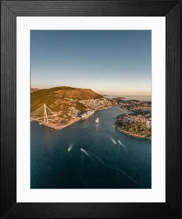 Framed Print : Aerial drone shot of Lapad Gruz peninsula area with Dubrovnik bridge cruise ship in Croatia summer sunset