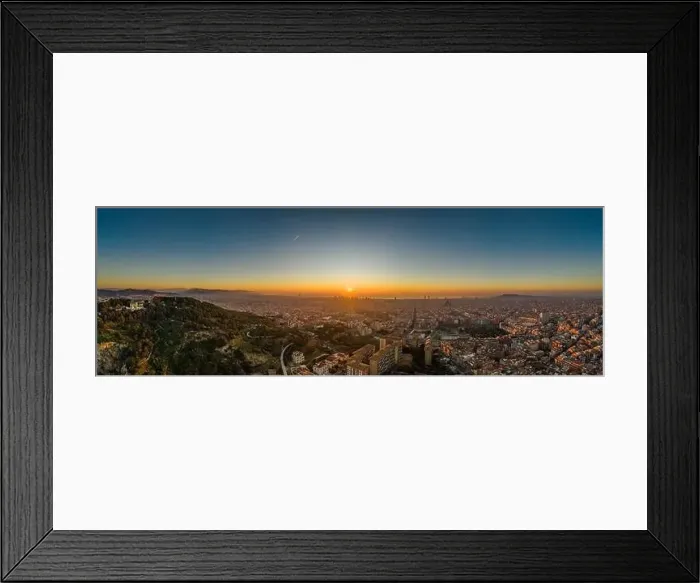 Framed Print : Aerial panorama drone shot of sunrise over sea horizon of Barcelona city in Spain winter dawn Framed Print : Aerial panorama drone shot of sunrise over sea horizon of Barcelona city in Spain winter dawn