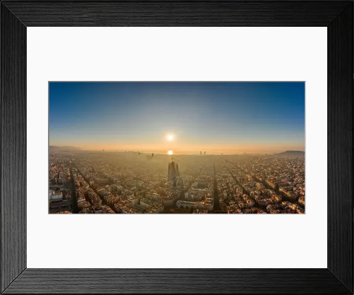 Framed Print : Aerial panorama drone shot of skyline in Barcelona city center in foggy sunrise golden hour in Spain winter Framed Print : Aerial panorama drone shot of skyline in Barcelona city center in foggy sunrise golden hour in Spain winter