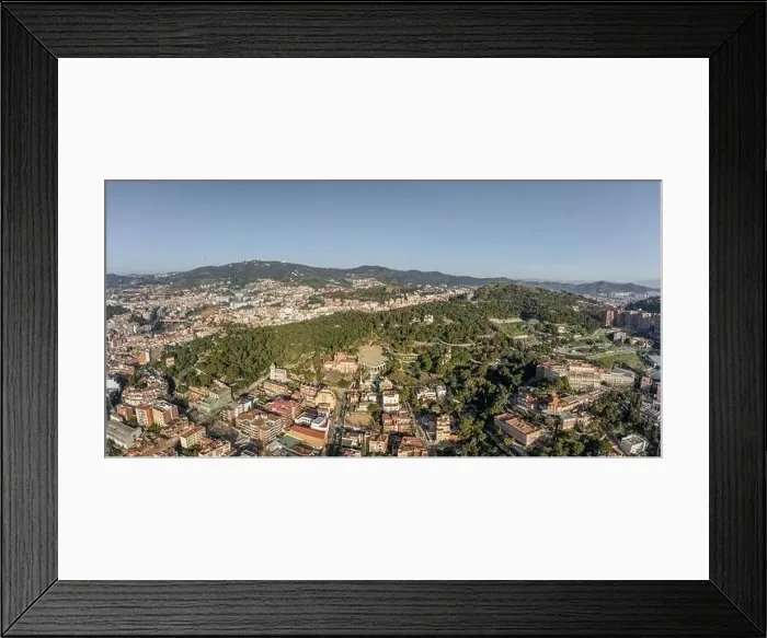 Framed Print : Aerial panorama drones shot of park on hill outside Barcelona city in Spain winter morning Framed Print : Aerial panorama drones shot of park on hill outside Barcelona city in Spain winter morning