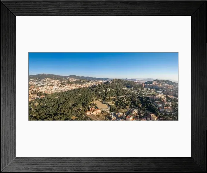 Framed Print : Aerial panorama drones shot of park on hill outside Barcelona city in Spain winter morning Framed Print : Aerial panorama drones shot of park on hill outside Barcelona city in Spain winter morning