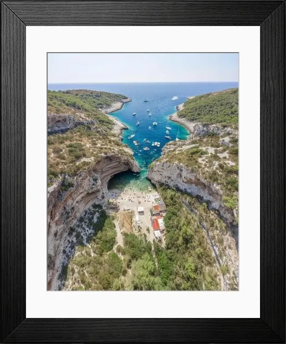 Framed Print : Aerial drone shot of iconic Stiniva cove beach of Adriatic sea on Vis Island in Croatia summer Framed Print : Aerial drone shot of iconic Stiniva cove beach of Adriatic sea on Vis Island in Croatia summer