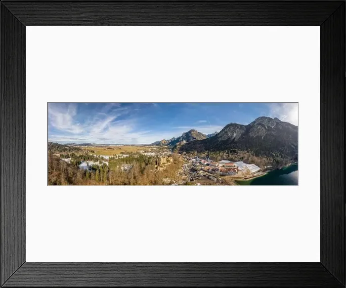 Framed Print : Aerial panorama drone shot of Hohenschwangau in Fussen with view of Neuschwanstein castle by lake in Germany winter Framed Print : Aerial panorama drone shot of Hohenschwangau in Fussen with view of Neuschwanstein castle by lake in Germany winter