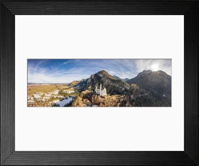 Framed Print : Aerial panorama drone shot of picturesque Neuschwanstein Castle on snowy hill in winter sunlight in Germany Framed Print : Aerial panorama drone shot of picturesque Neuschwanstein Castle on snowy hill in winter sunlight in Germany