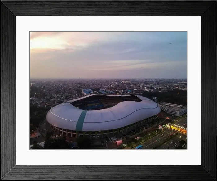 Framed Print : Aerial View of The largest stadium of Bekasi from drone when sunset and noise cloud. Bekasi, Indonesia, March 21, 2021 Framed Print : Aerial View of The largest stadium of Bekasi from drone when sunset and noise cloud. Bekasi, Indonesia, March 21, 2021