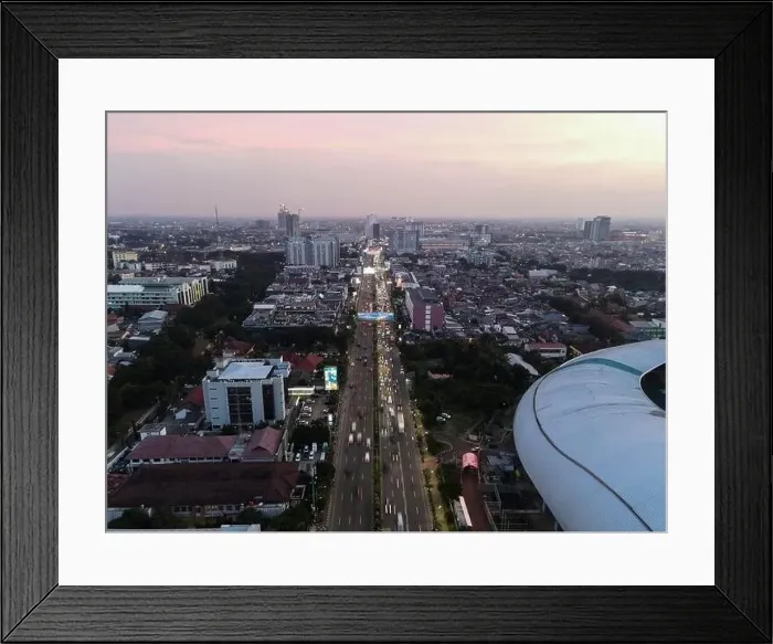 Framed Print : Aerial View of The largest stadium of Bekasi from drone when sunset and noise cloud. Bekasi, Indonesia, March 21, 2021 Framed Print : Aerial View of The largest stadium of Bekasi from drone when sunset and noise cloud. Bekasi, Indonesia, March 21, 2021