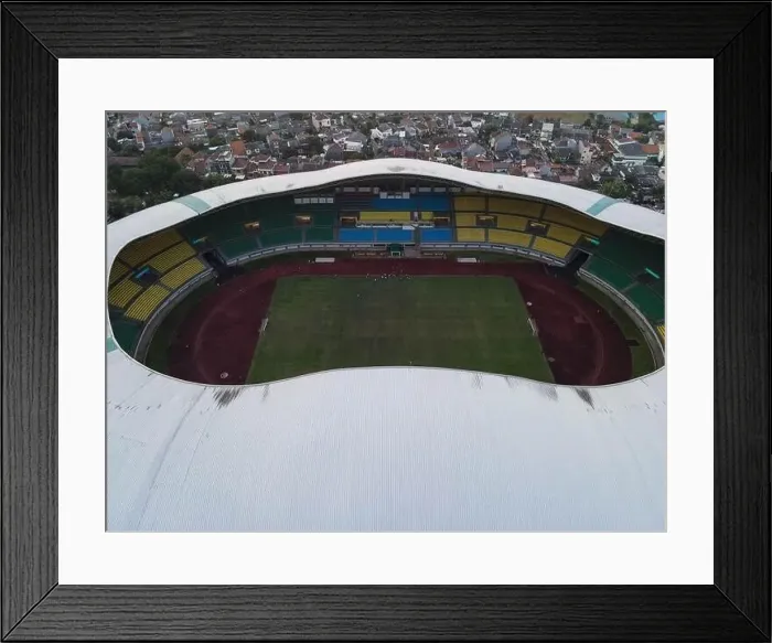 Framed Print : Aerial View of The largest stadium of Bekasi from drone when sunset and noise cloud. Bekasi, Indonesia, March 21, 2021 Framed Print : Aerial View of The largest stadium of Bekasi from drone when sunset and noise cloud. Bekasi, Indonesia, March 21, 2021
